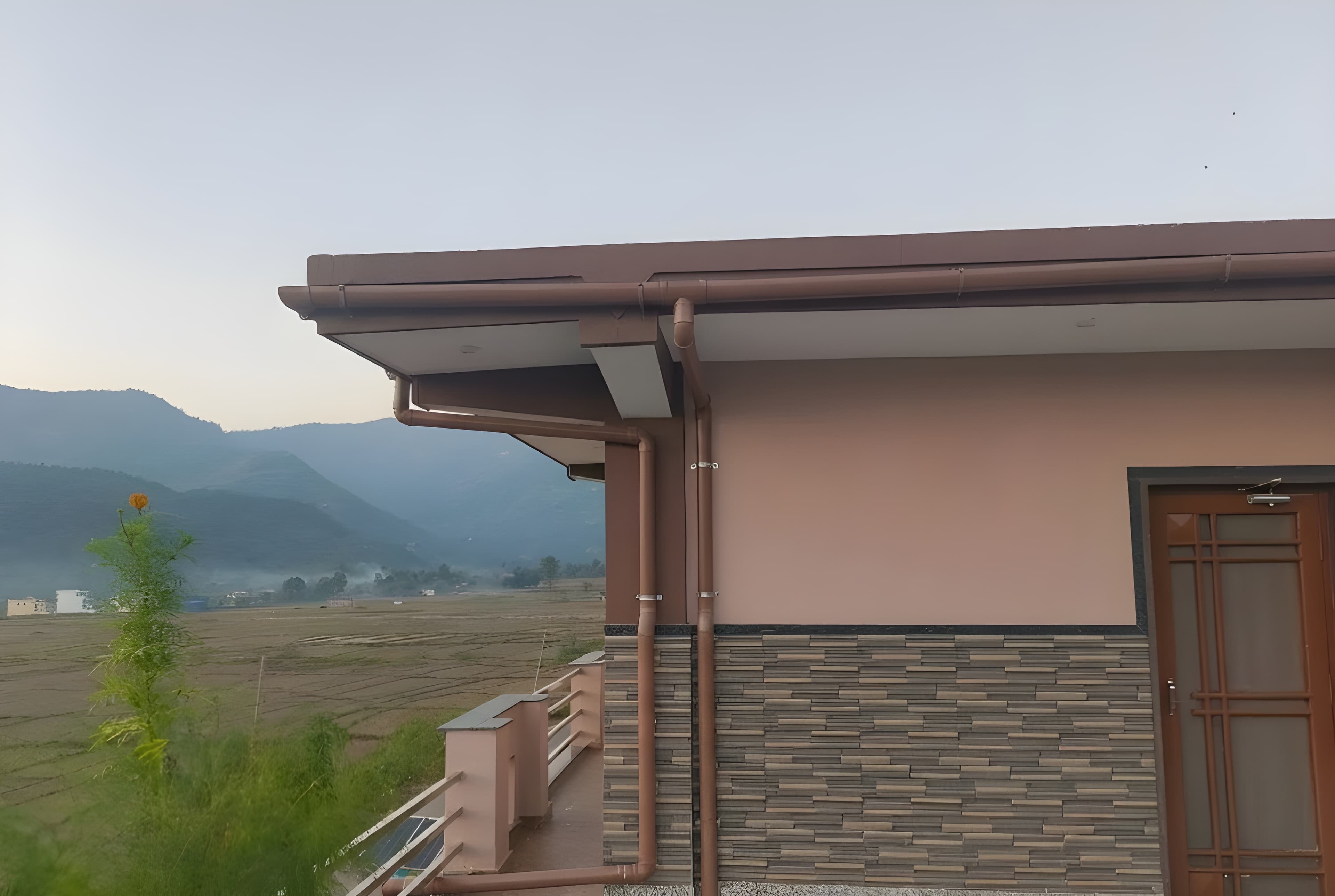 Rainwater harvesting system on a residential roof.